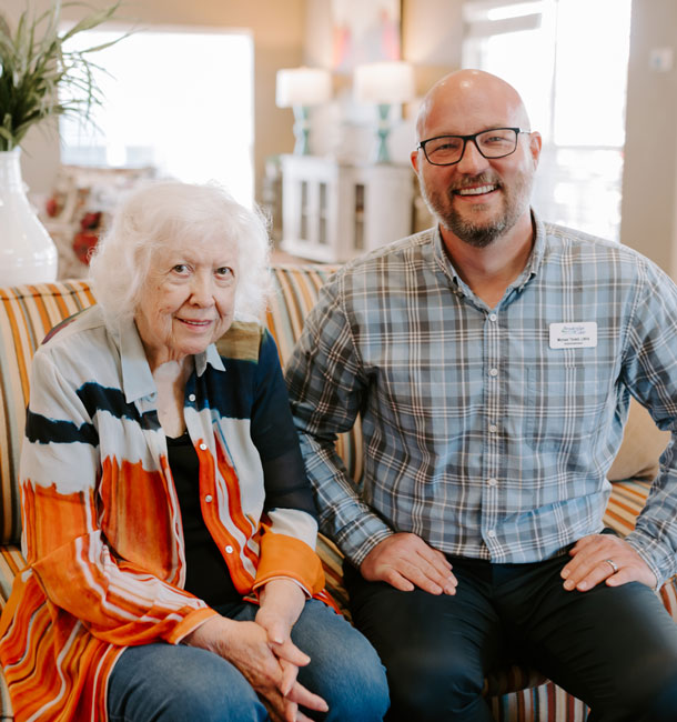 Elder at Brookridge Cove sitting with Administrator